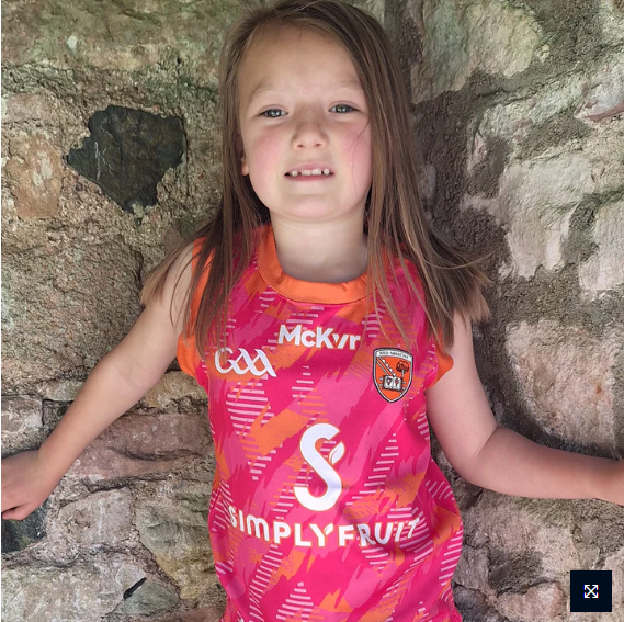 ARMAGH GAA BOOST TRAINING VEST KIDS PINK/ORG